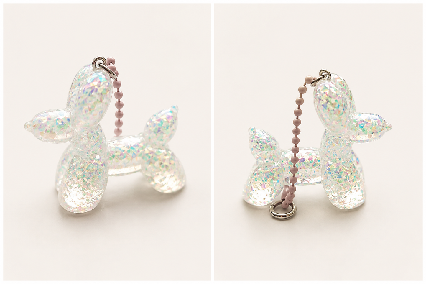 Balloon Dog artigianale in resina Trasparente iridescente, realizzato a mano da Maniko Creations. Disponibile come ciondolo con catenella o come piccola decorazione.