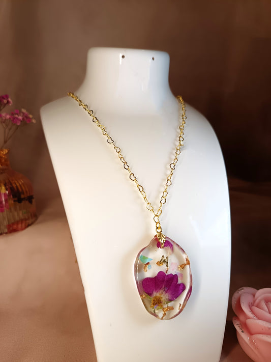 Collana Bacio di Viola con fiore viola in resina trasparente
