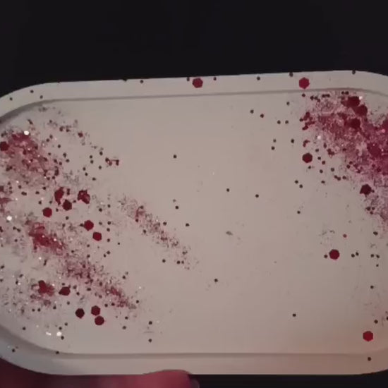 Video vassoio Scintille di Luce - effetto luccichio dei glitter rossi in movimento"